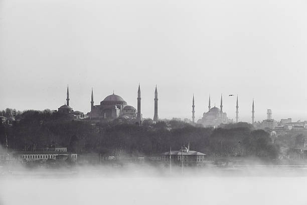 Istanbul view in fog Foggy weather day of Istanbul city view with Hagia Sophia, Sultanhmet Mosque topkapi palace stock pictures, royalty-free photos & images