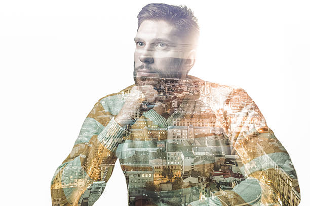 istock Double exposure of a man and city 517610454