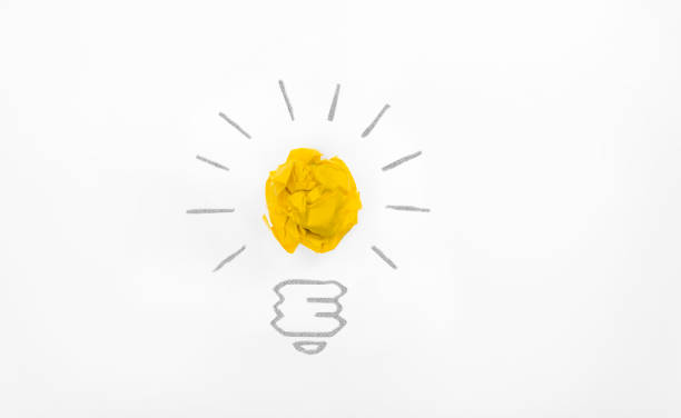istock Inspiration concept crumpled paper light bulb metaphor 517611716