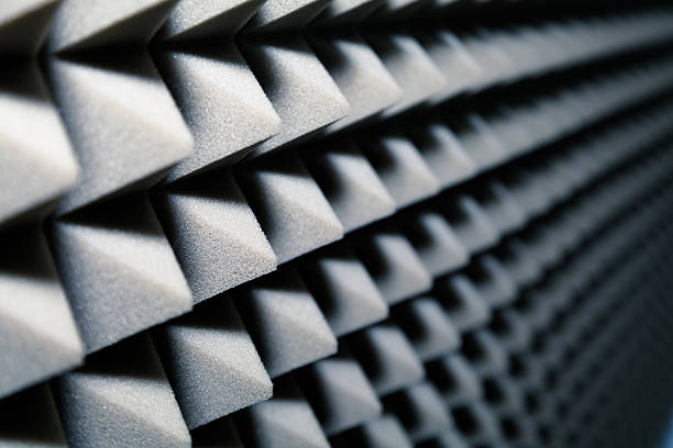 istock Dampening acoustical foam on recording studio wall 517612000