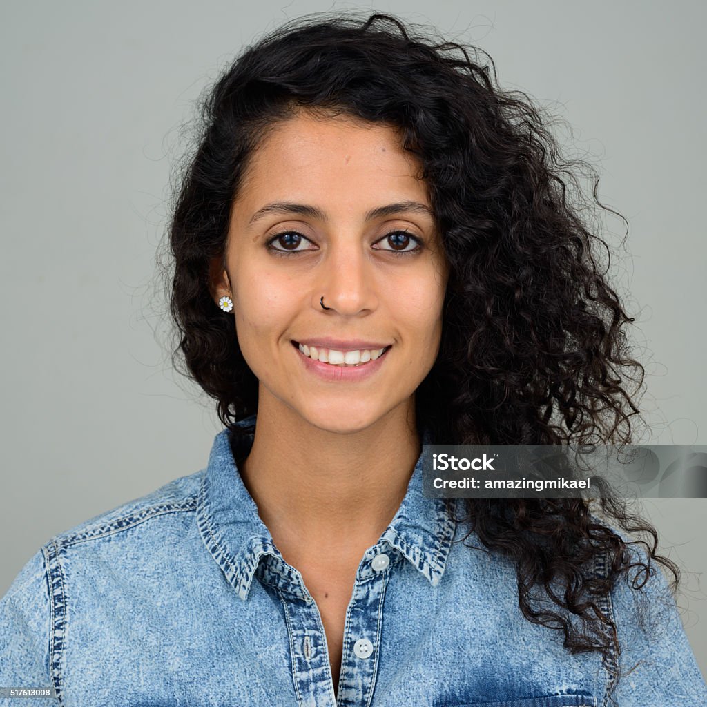 Hispanic woman Studio shot of Hispanic woman standing 20-24 Years Stock Photo