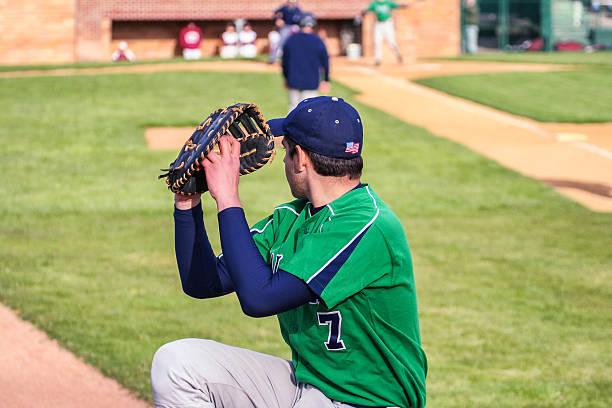 istock Left Handed Baseball Pitcher Warm Up Throwing 517613282