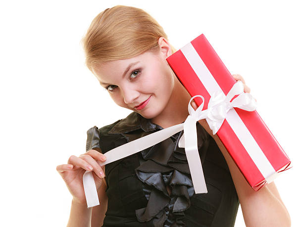 istock holidays love happiness concept - girl with gift box 517614487