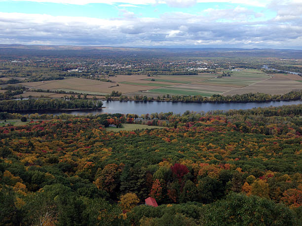 The view from atop Mount Holyoke in Western Massachusetts includes the Connecticut River and autumn leaves beginning to show colors.