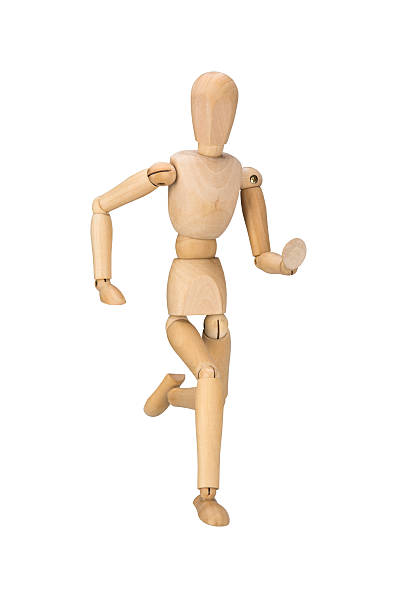 istock wooden mannequin, isolated on white background 517614711