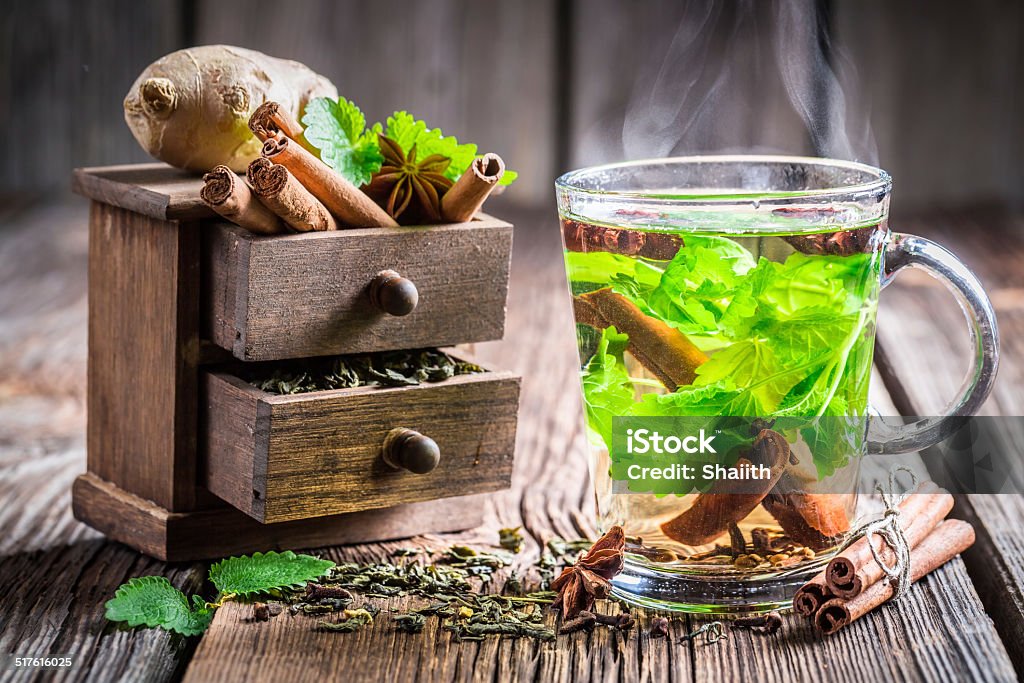 Hot tea with cinnamon and ginger Hot tea with cinnamon and ginger. Anise Stock Photo