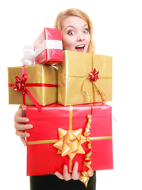 istock holidays love happiness concept - girl with gift boxes 517616177