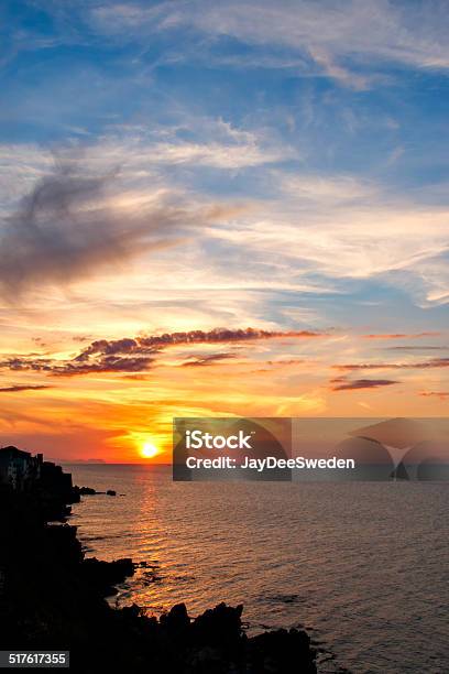 Sunset By The Ocean In Sicily Stock Photo - Download Image Now - Awe, Back Lit, Bay of Water