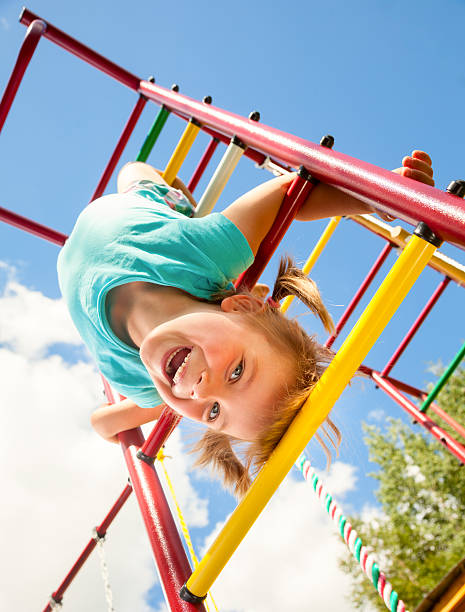 istock Happy child on a jungle gym 517617711