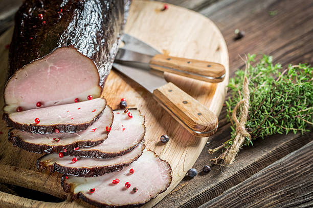istock Closeup of fresh smoked ham in pantry 517619083