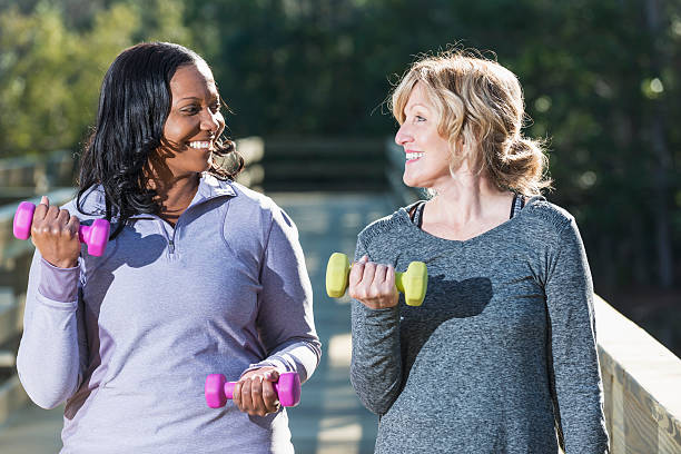 istock Women exercising in park 517619381