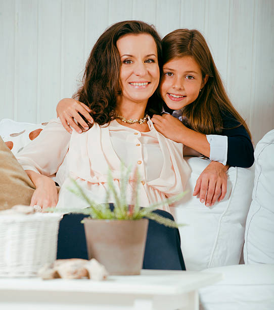 istock happy mother with daughter at home 517620837