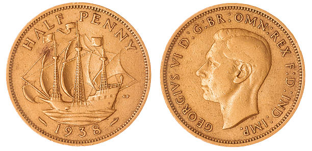 istock Half penny 1938 coin isolated on white background, Great Britain 517625828