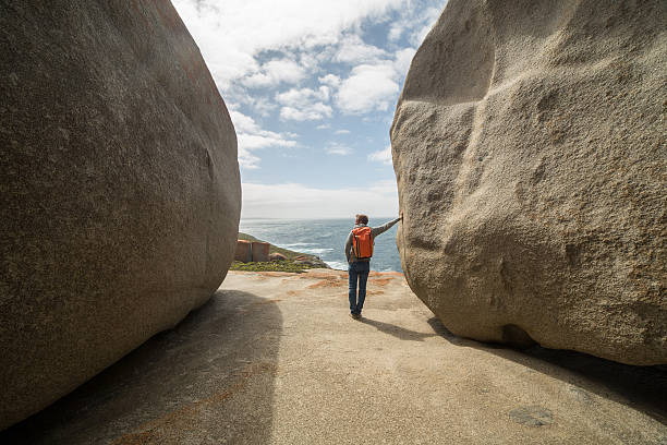 istock Traveler at the Remarkable rocks on Kangaroo Island 517627576