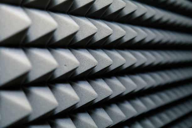 istock Dampening acoustical foam on recording studio wall 517627914