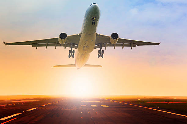 istock passenger plane taking over airport runway use for air transport 517631288