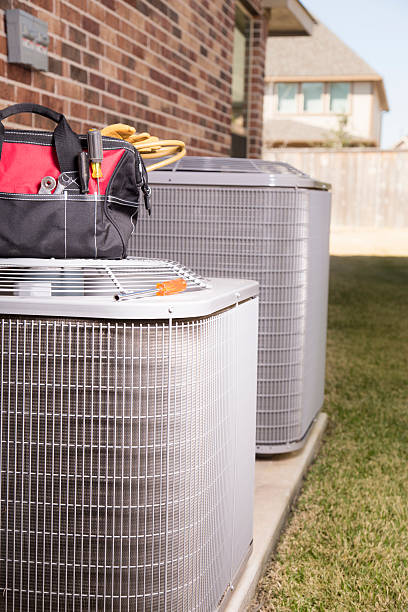 istock Service Industry:  Work tools on air conditioners. Outside home. 517631544