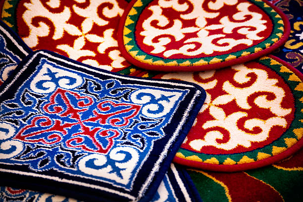 азиатские этнических ковер - bedding merchandise market textile стоковые фото и изображения