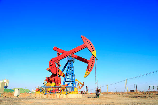 istock Oil field, oil pump in the work 517632958