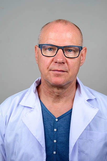 istock Mature man doctor 517633830