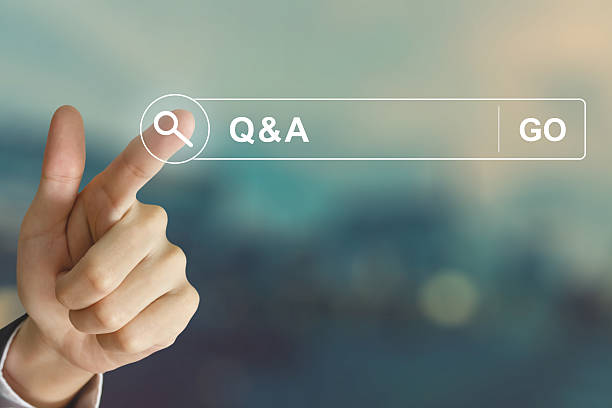 business hand clicking Q&A or Question and Answer button stock photo