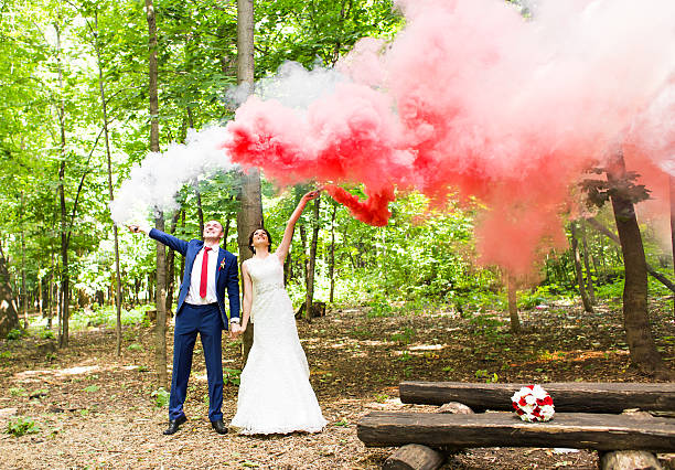 istock Wedding couple having fun and walk in the park 517635640