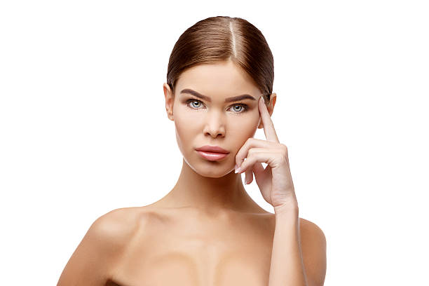 istock Beautiful Woman with Clean Fresh Skin 517636010
