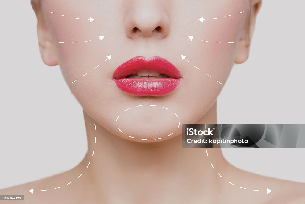 Portrait of young woman with arrows on her face Portrait of young, beautiful and healthy woman with arrows on her face. spa, plastic surgery, face lifting and make-up concept Botulinum Toxin Injection Stock Photo