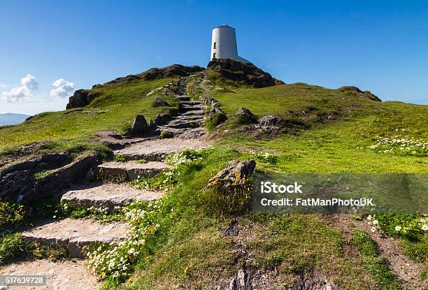 White Lighthouse On Llanddwyn Island Anglesey Stock Photo - Download Image Now - Anglesey - Wales, Atlantic Ocean, Beach