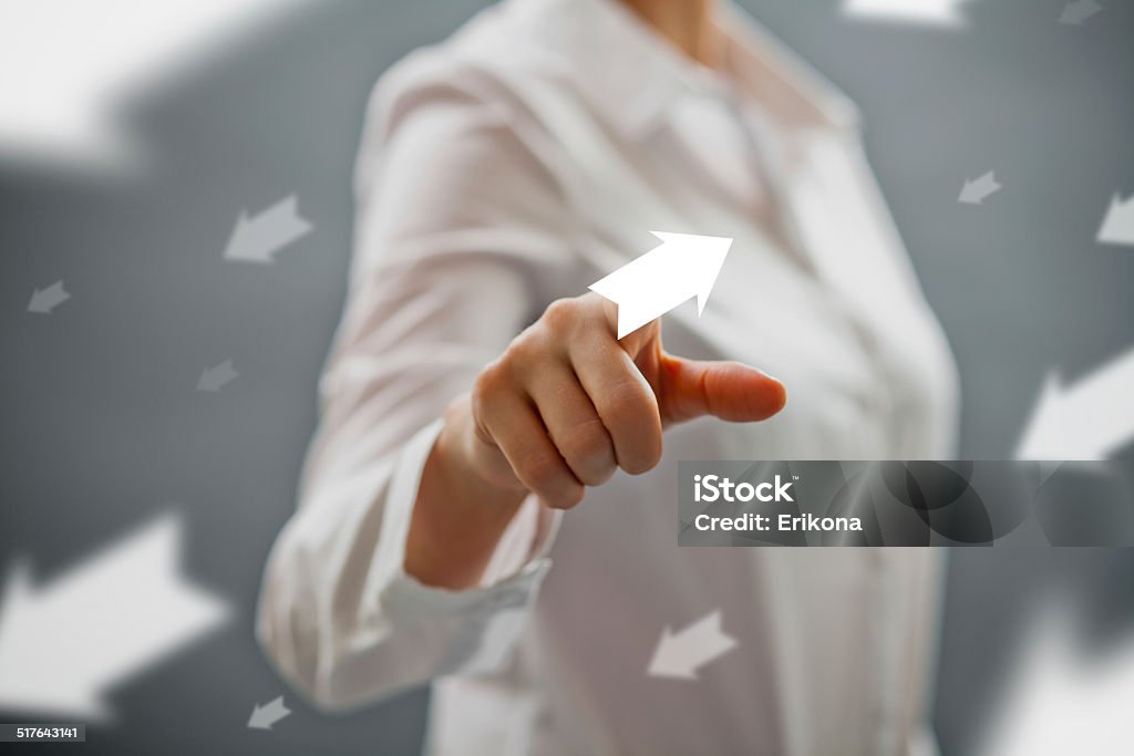 Growth up Businesswoman touching true target Adult Stock Photo