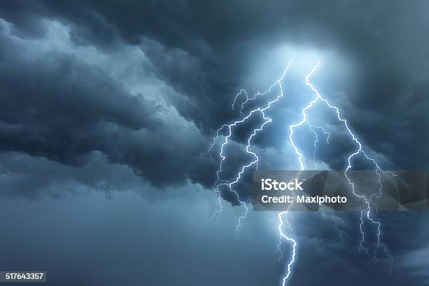 Thunderstorm Lightning With Dark Cloudy Sky Stock Photo - Download Image Now - Storm, Lightning, Thunderstorm