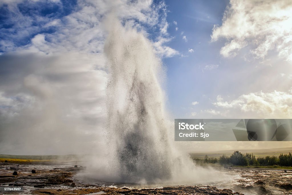 Geyser Strokkur Iceland Geyser Strokkur erupting hot water and steam at the end of the day in Iceland Beauty In Nature Stock Photo