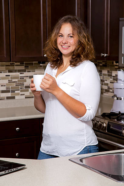 istock woman in the kitchen 517645863