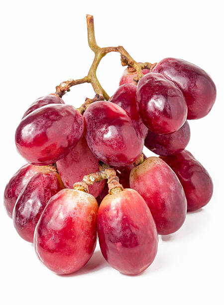 istock Ripe red grapes isolated on white background 517653128