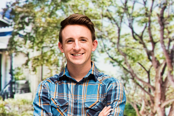 istock Smiling man outdoor and looking at camera 517653148