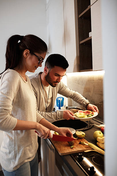 istock Preparing food at the kitchen 517653660