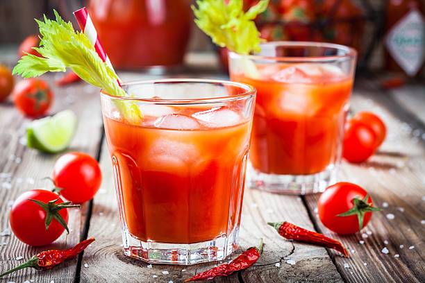 istock Cocktail Bloody Mary with ice in glasses 517654680