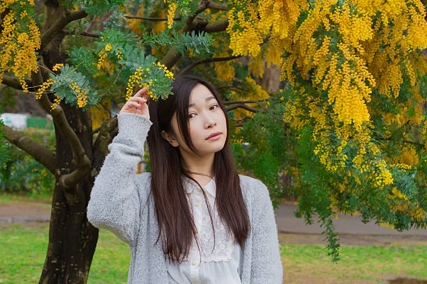 istock Japanese woman relaxing in green 517658558