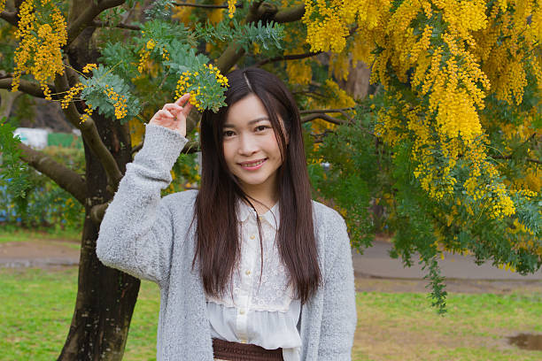 istock Japanese woman relaxing in green 517659126