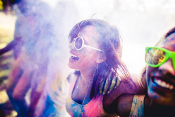 istock Multi-Ethnic Group Celebrating Holi Festival in Park 517660880