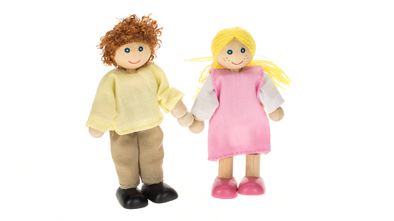 Male and female family dolls - white background