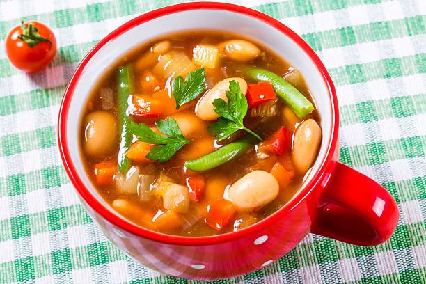 istock Minestrone vegetable soup with parmesan cheese, beans, cauliflow 517661854