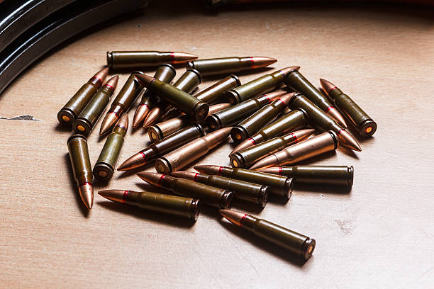 istock ammo for machine guns with loaded magazines 517662274