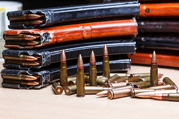 istock ammo for machine guns with loaded magazines 517662482