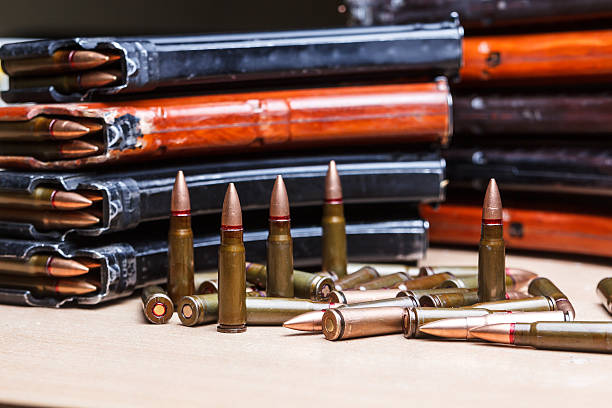 istock ammo for machine guns with loaded magazines 517662530