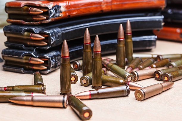 istock ammo for machine guns with loaded magazines 517662682