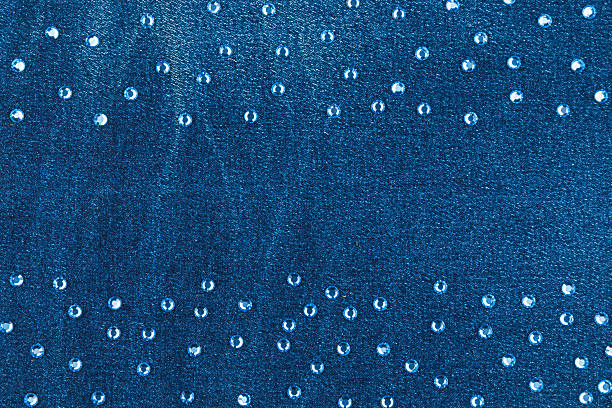 Fashionable background, denim  and blue  rhinestones, with space for your text