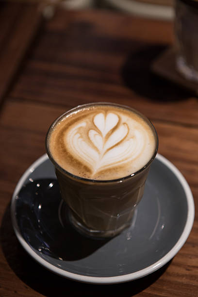 istock hot coffee latte with latte art on top 517663274