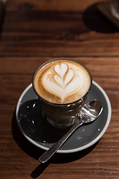istock hot coffee latte with latte art on top 517663348