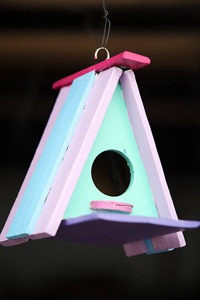 istock creative wooden bird house 517664214